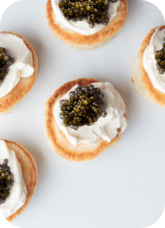 Premium caviar production showing why careful sturgeon harvesting influences caviar price